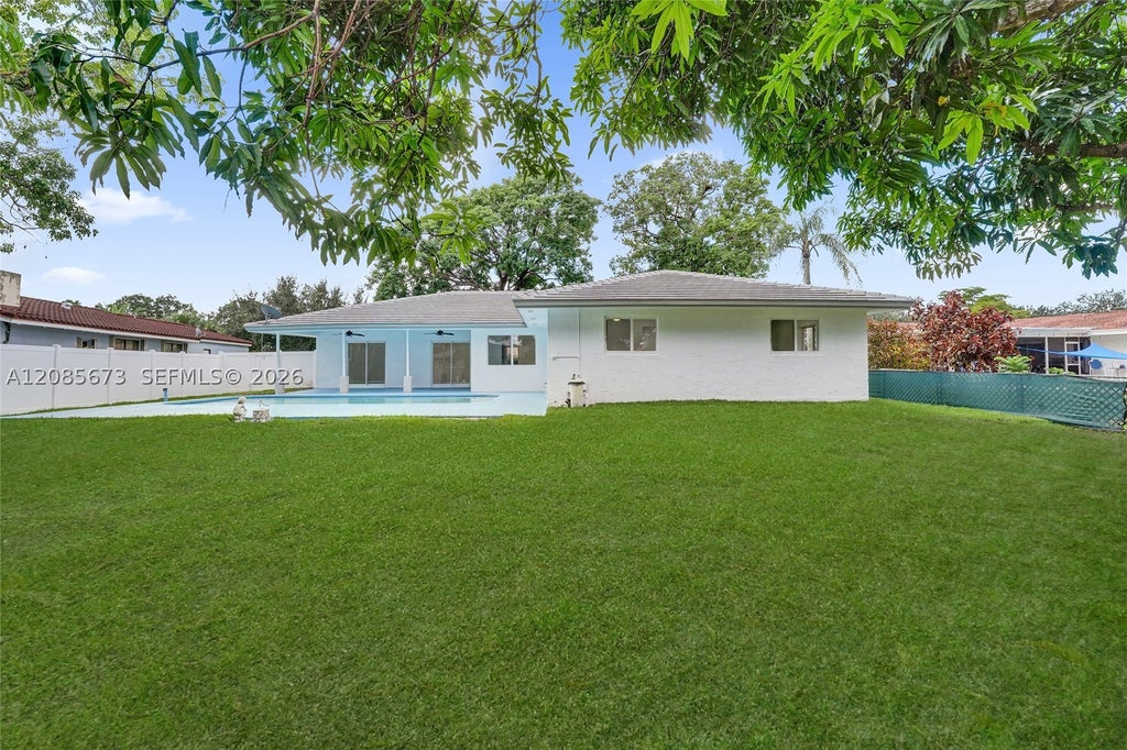 Photo of 10601 NW 43rd Ct, Coral Springs, FL 33065 (MLS # A12085673)