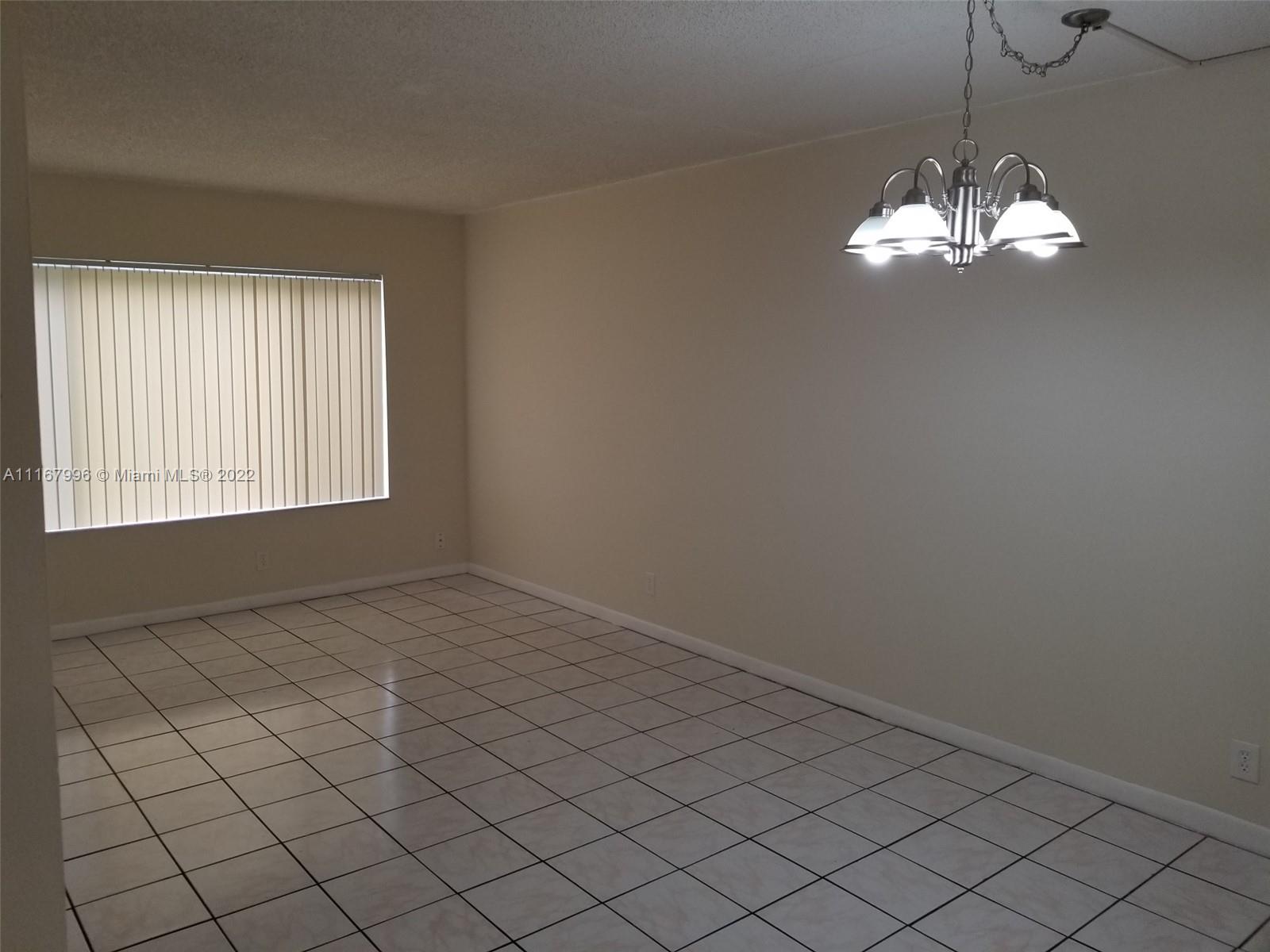 2 BEDROOM 2 BATH CONDO COMPLETELY TILED, WASHER & DRYER IN UNIT.ONE BLOCK SOUTH OF SAMPLE RD AND CORAL SPRINGS DR. MAINTENANCE INCL WATER, SEWER, TRASH REMOVAL, CENTRALLY LOCATED IN THE HEART OF CORAL SPRINGS, GREAT FOR FIRST TIME HOME BUYERS OR INVESTORS.