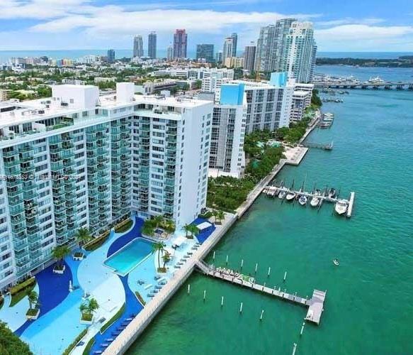 Step into this light and bright 2 bedroom, 2 fully renovated bathroom corner unit condo on West Ave, steps from Sunset Harbour and famous South Beach! This spacious residence offers an open layout, updated kitchen, private balcony, 6 closets for all your items and resort-style amenities, including a pool, gym, and concierge. The bedrooms all have blackout curtains for that restful night sleep! Walk to the beach, Lincoln Road, and top dining spots like Pubbelly Sushi and Lucali. You are close to the vibrant nightlife but just far away enough to come home to your sanctuary. Located near top-rated schools and gyms. Live the ultimate Miami Beach lifestyle—schedule your tour today!