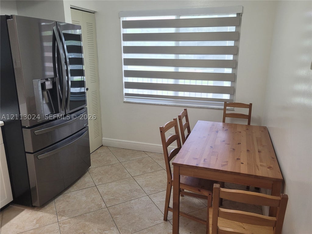 Photo of 1200 SW 130th Ave #207G, Pembroke Pines, FL 33027 (MLS # A12113024)