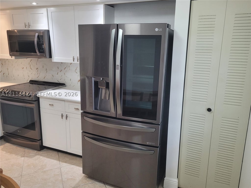 Photo of 1200 SW 130th Ave #207G, Pembroke Pines, FL 33027 (MLS # A12113024)