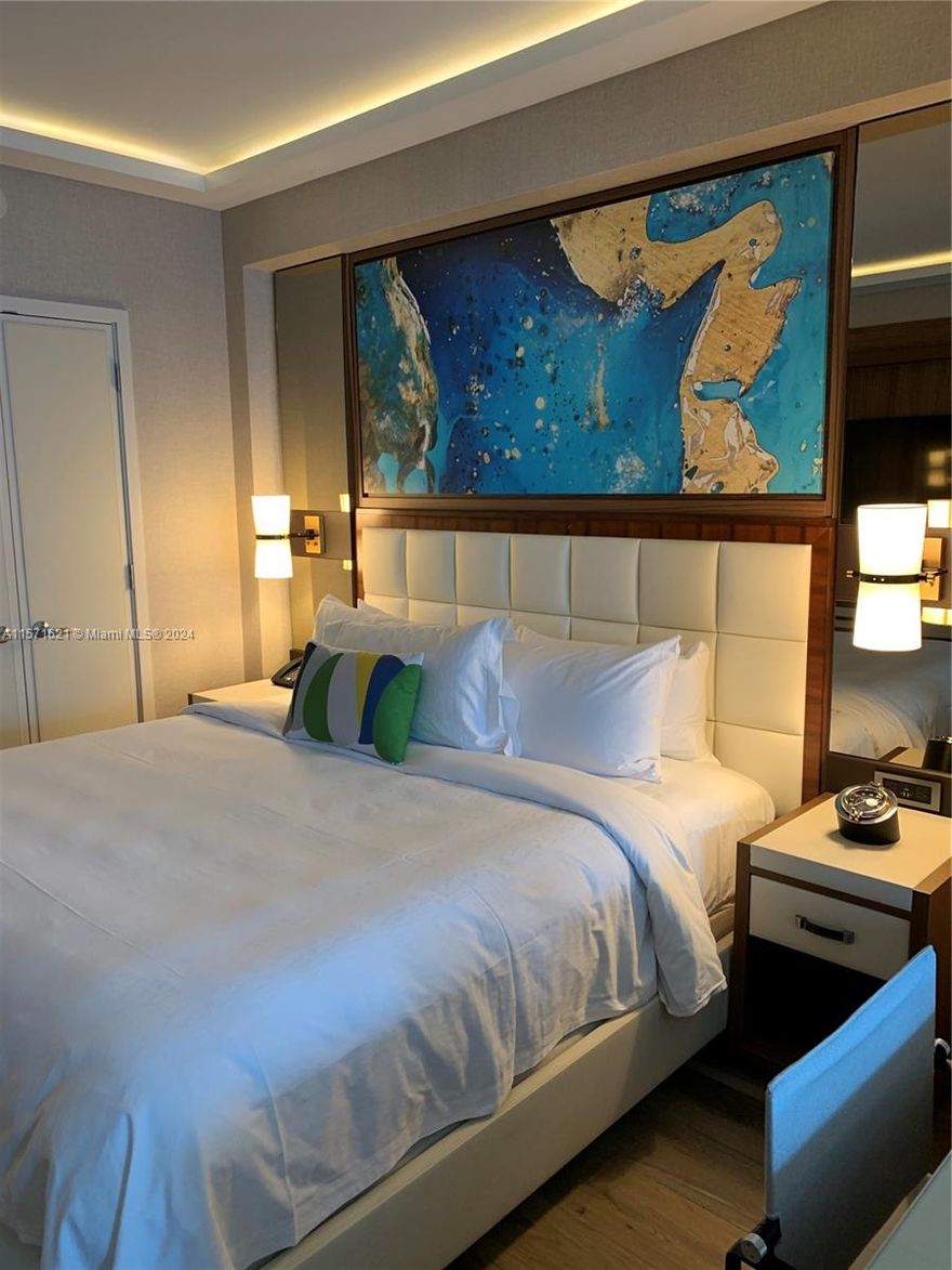 Experience the epitome of luxury living in this exquisite ocean-facing studio located within a prestigious condo hotel. Boasting a light and comfortable ambiance, the room is thoughtfully designed with spacious layout and features a personal closet for your belongings. The bathroom is equipped with two double sinks for added convenience. Step out onto the expansive balcony overlooking the sparkling pool area and the mesmerizing ocean, providing a tranquil retreat. As a resident, indulge in a plethora of amenities including a state-of-the-art gym, inviting pool, relaxing spa, and gourmet restaurants. Enjoy the privilege of personalized service, where upon your arrival at the airport, a dedicated chauffeur will be waiting for you.
