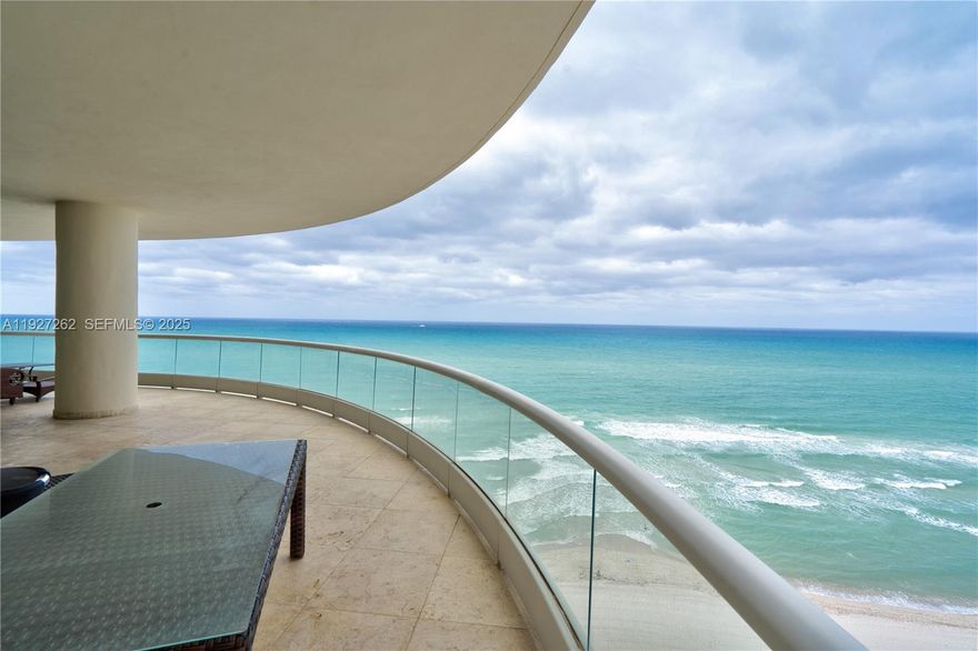 Experience ultra-luxury oceanfront living at the prestigious Turnberry Ocean Colony in this spectacular 3-bed, 4.5-bath with 3,735 sqft residence on the 16th floor. This flow-through condo offers breathtaking direct ocean views from the main living areas and intracoastal and sunset views from the secondary bedrooms, creating the ultimate South Florida lifestyle. Step through private elevator entry into an elegant foyer that opens to an expansive living and dining space with floor-to-ceiling glass, high ceilings, and a large oceanfront terrace perfect for relaxing or entertaining. The gourmet chef’s kitchen features top-of-the-line appliances, breakfast area, and stunning views. The grand primary suite includes a luxurious spa-style bathroom with marble finishes, jacuzzi tub, double vanities, and a custom walk-in closet. Turnberry Ocean Colony is a five-star community offering full-service beach and pool amenities, private restaurants, world-class fitness center, spa, concierge, valet, and 24-hour security. Located in the heart of Sunny Isles Beach near Bal Harbour, Aventura Mall, fine dining, and top-rated schools. This residence combines elegance, comfort, and resort-style living—a true oceanfront jewel and a must-see property. In addition to 2 parking spaces the unit comes with a private 2-car garage and storage.