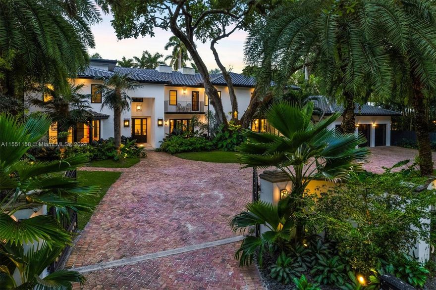 Completely renovated in 2022, the stunning 7,599 SF estate is tucked away on Leafy Way, a quiet private road in highly sought after South Coconut Grove. With 20,125 SF of lush tropical grounds, the property presents a serene oasis with optimal privacy and gated entry. The 4-BD, 5.5-BA residence showcases spectacular light-filled living spaces featuring double-height ceilings, and premium finishes, epitomizing luxury living. A gourmet kitchen with floor-to-ceiling cabinetry, island, and top-of-the-line appliances. The backyard includes a summer kitchen and heated pool with waterfall jacuzzi. Additional features include two offices, whole house generator, smart home system, impact windows/doors, and a 3-car garage.