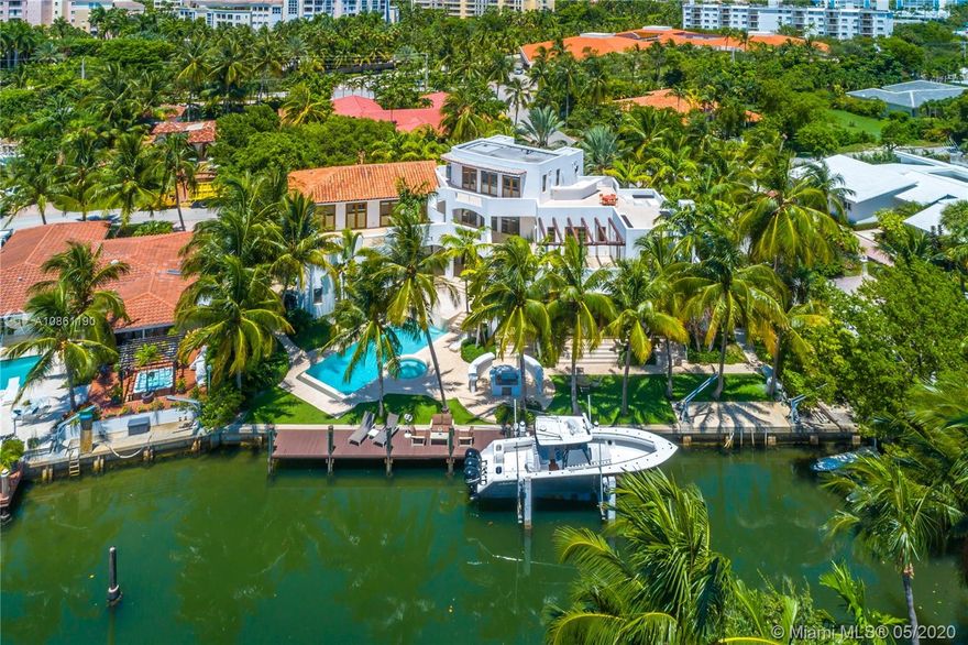Incredible modern Mediterranean estate on island paradise, Key Biscayne. This gorgeous waterfront was built in 2007 and sits on an amazing corner lot which looks down the canal where you can enjoy stunning sunsets. This home offers 150 ft of waterfront with a 70 ft dock including a boat lift creating a perfect fit for any boater’s dream. Full of natural light throughout, exquisite finishes, very large terraces designed for those who like to entertain, spectacular pool area, elevator for all 3 floors, wet bar, 3 car garage and lush landscaping. Island Drive is located on one of the highest areas on Key Biscayne for insurance purposes. Simply magnificent architecture and one of a kind design for any family to enjoy.