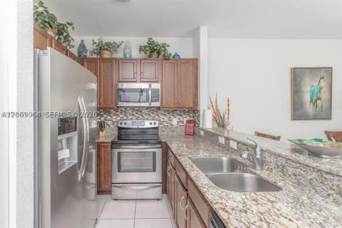 Tiny photo for 8922 SW 18th St, Miramar, FL 33025 (MLS # A12069064)