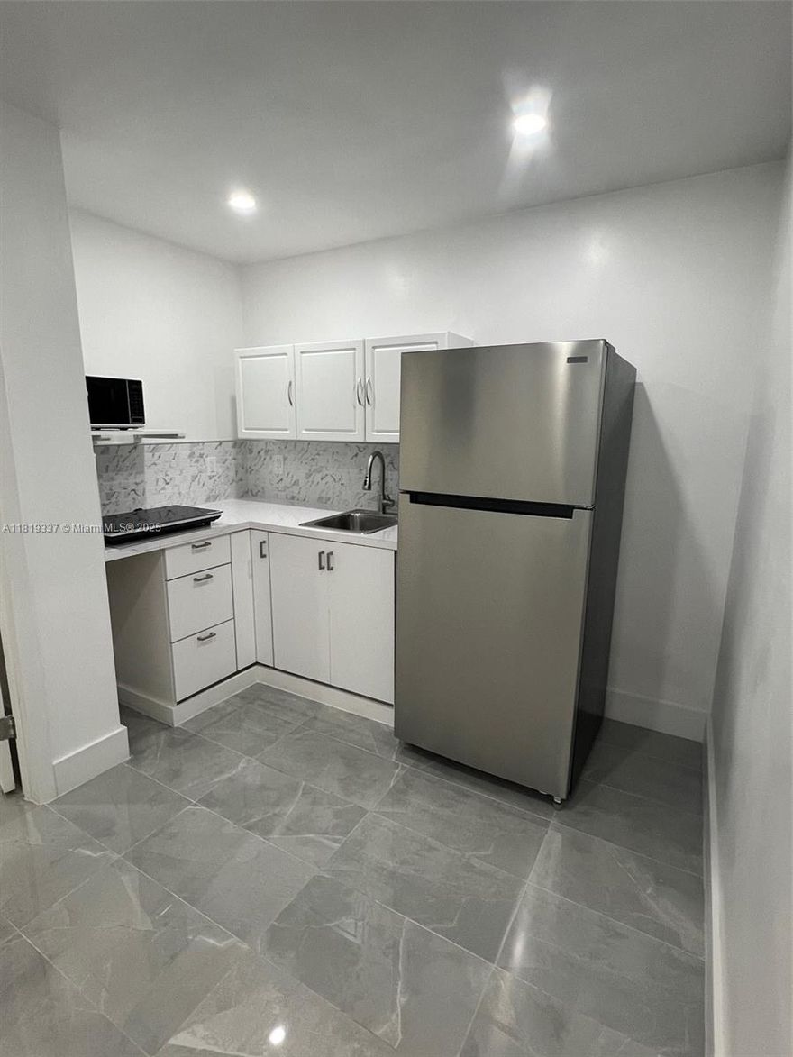 This stunning brand new built 2-bed, 1.5-bath apartment, offers a perfect blend of modern comfort and private living. Step through your private entrance into a bright contemporary finished home. Delight in the convenience of a brand new kitchen, spacious bedrooms, and a stylish half-bath complementing the full bathroom. You can relax in your own private backyard and patio area, ideal for outdoor dining and enjoying the lovely outdoor weather. Includes parking for two vehicles. Washer and Dryer included. Electricity, water