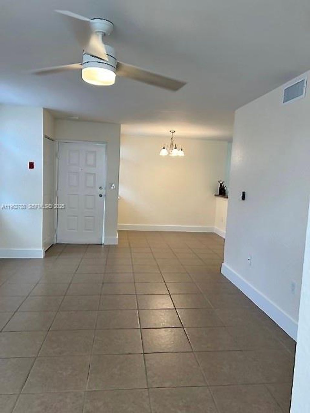 Photo of 2811 N Oakland Forest Dr #102, Oakland Park, FL 33309 (MLS # A11962788)