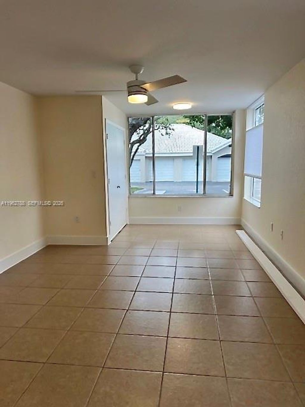 Photo of 2811 N Oakland Forest Dr #102, Oakland Park, FL 33309 (MLS # A11962788)