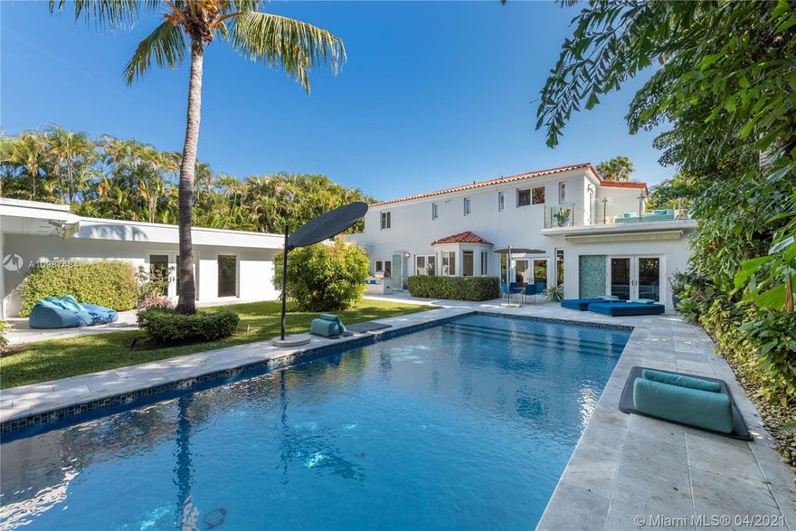 Superbly remodeled and exquisitely furnished with high-end European furniture by Paola Lenti and Ligne Roset, this art deco gem on tranquil Flamingo Drive in South Beach is offered fully furnished and move-in ready! Updated in 2017 with impact glass windows, Control4 system, new baths, new HVAC, and modern chef’s kitchen, this luxe home offers great living space, breakfast room, formal dining, media room, office, and 2 beds down. Beautiful staircase with intricate tile design wall will take you to the 2 bedrooms up, including the master suite with an opulent bath, 2 walk-in closets, and a private terrace. The lushly secluded backyard is equipped with a saltwater pool, pizza oven, summer kitchen, and patios for lounging. Perfectly located near the beach. Rare find!