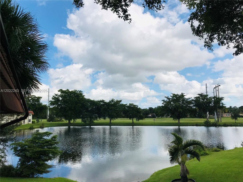 Photo of 565 NW 100th Pl #203, Pembroke Pines, FL 33024 (MLS # A12022243)