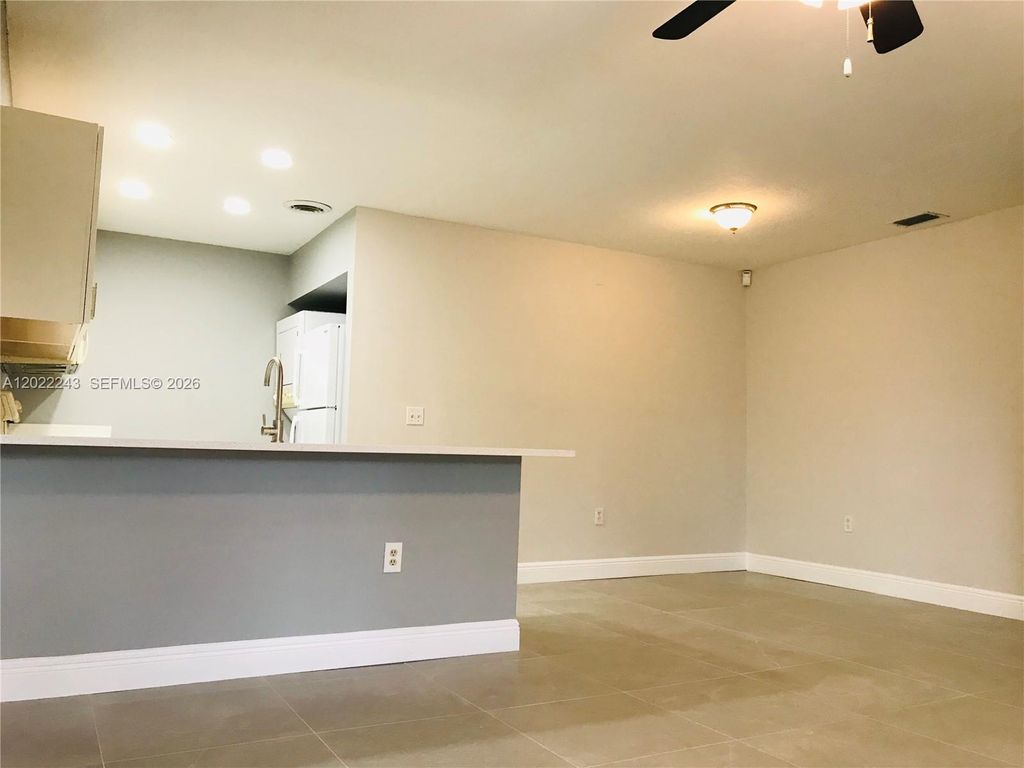 Photo of 565 NW 100th Pl #203, Pembroke Pines, FL 33024 (MLS # A12022243)