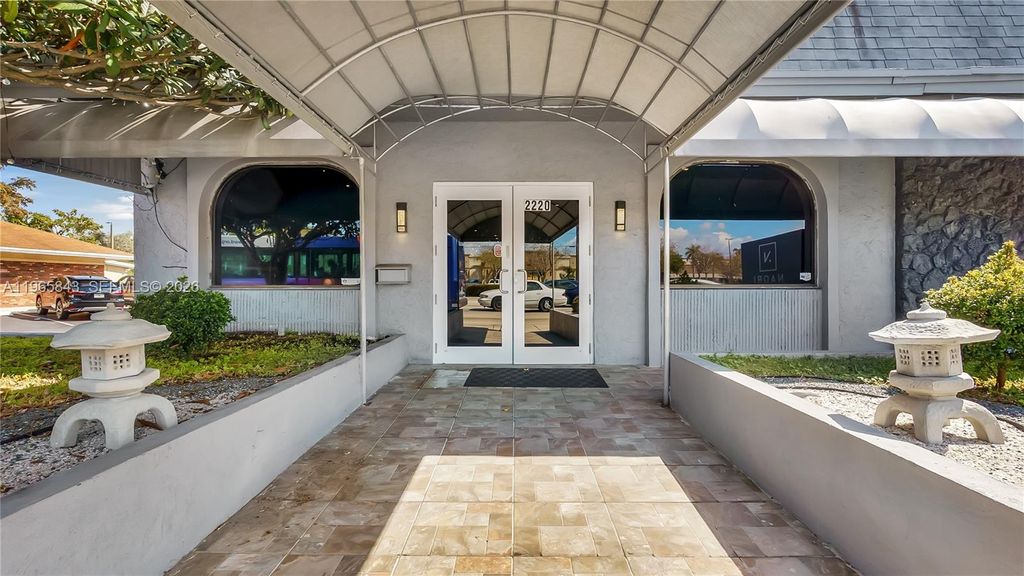 Photo of 2220 N University Dr, Sunrise, FL 33322 (MLS # A11965843)