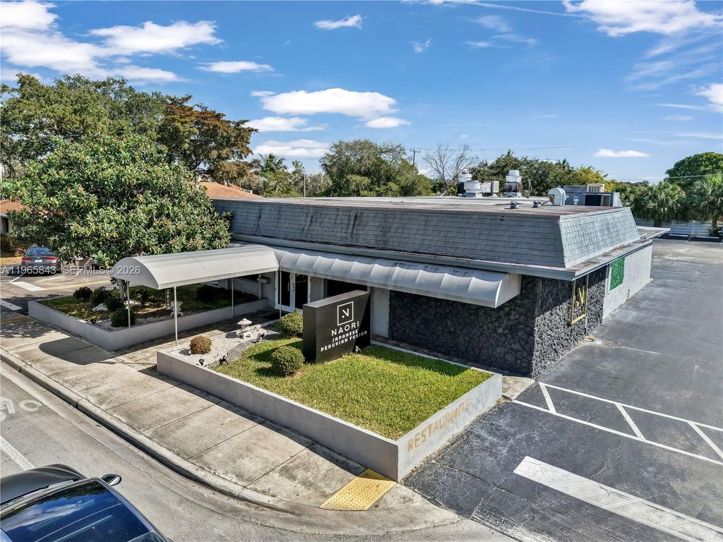 Photo of 2220 N University Dr, Sunrise, FL 33322 (MLS # A11965843)