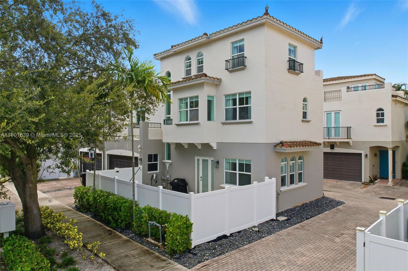 Experience the privacy of a single-family home in this 3-story, 3-bed, 3.5-bath corner-unit townhome in Victoria Park. Rare Fee Simple ownership means no HOA fees and total freedom.
Fully updated with a modern kitchen, stylish bathrooms, and bright open living spaces, each bedroom includes an ensuite bath. Enjoy a private driveway & garage, fenced-in front yard, and a rooftop terrace with downtown skyline views.
Set on a quiet dead-end street with no through traffic, this home offers the best lot in the community. Walk to Holiday Park featuring pickleball & tennis courts, baseball fields, walking trails, and the Panthers Ice Arena. Just minutes from Las Olas Boulevard, Downtown, and the Beach.