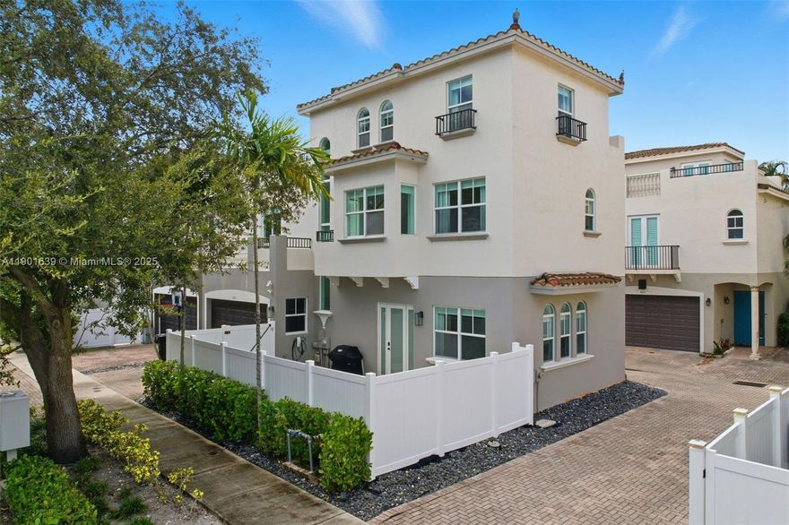 Experience the privacy of a single-family home in this 3-story, 3-bed, 3.5-bath corner-unit townhome in Victoria Park. Rare Fee Simple ownership means no HOA fees and total freedom.
Fully updated with a modern kitchen, stylish bathrooms, and bright open living spaces, each bedroom includes an ensuite bath. Enjoy a private driveway & garage, fenced-in front yard, and a rooftop terrace with downtown skyline views.
Set on a quiet dead-end street with no through traffic, this home offers the best lot in the community. Walk to Holiday Park featuring pickleball & tennis courts, baseball fields, walking trails, and the Panthers Ice Arena. Just minutes from Las Olas Boulevard, Downtown, and the Beach.