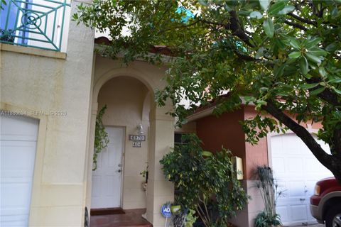 Photo of 6970 NW 174th Ter #404, Hialeah, FL 33015 (MLS # A11886634)