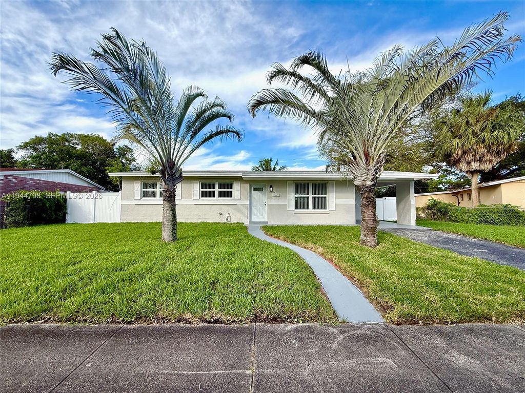 Photo of 671 NW 37th Ave, Lauderhill, FL 33311 (MLS # A11944798)