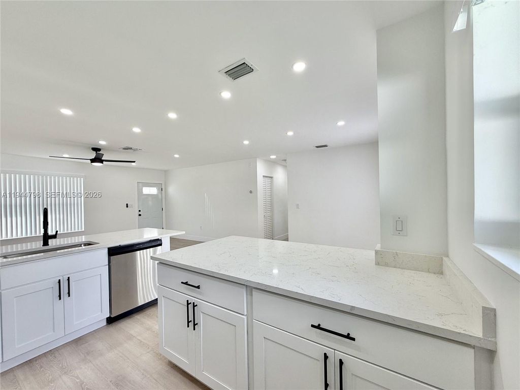 Photo of 671 NW 37th Ave, Lauderhill, FL 33311 (MLS # A11944798)