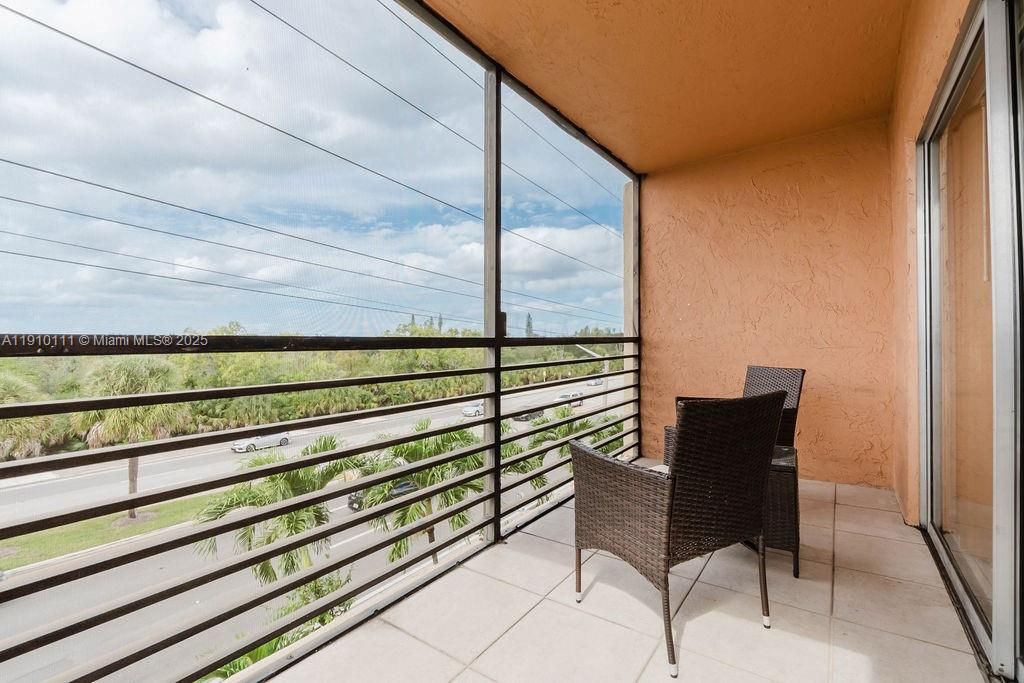 Photo of 3110 N Pine Island Rd #409, Sunrise, FL 33351 (MLS # A11910111)