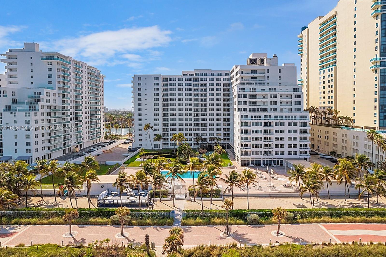 PRICE REDUCED! Beautiful penthouse with a serene beach-style feel and direct Intracoastal and bay views! This spacious 1-bedroom converted to 2-bedroom home is ideal for entertaining, offering stunning city and bay vistas and ample closet space. Located in Miami Beach's Millionaire Row, this renovated high-rise condo features impact windows and resort-style amenities: a heated pool, library, gym, jacuzzi, BBQ area, and beach access via the oceanfront boardwalk. The building is 40/50-year certified by the Miami Beach Building Department. Includes 1 assigned parking space with valet. HOA covers A/C, basic cable, parking, and Wi-Fi. Please be aware that the seller will pay off the current assessment.