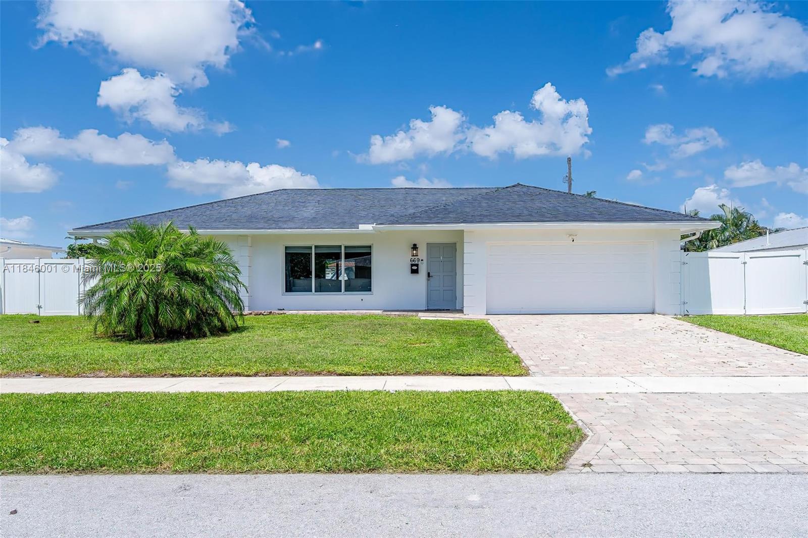 Experience elevated living in this exquisitely upgraded 4-bedroom, 3-bath residence in prestigious East Boca Raton. Featuring a newly replastered pool with a brand-new motor, expansive marble patio, and custom concrete side yard ideal for boat or vehicle storage. No detail overlooked—remodeled garage, smooth skim-coated ceilings with high hat LED lighting, custom-built closets throughout, and premium spray foam roof insulation. Freshly painted inside and out, enhanced with outdoor ambient lighting and designer ceiling fans. Includes a sleek, modern wall-mounted water heater. A true move-in ready gem!