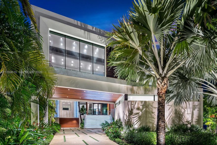 Stunning Bay/Canal Contemporary Residence- 100+ ft on deep water - New Construction (total of 12,924 SF under A/C).  Loaded with ultra luxury finishes and very little use - 35KM solar electric generator w/six Tesla power walls & Travertine exterior walls.  All custom lighting & sound throughout.  Unique glass elevator to all three levels.  Generous sized rooms and large closets.  Art Gallery, Office-Library, amazing 12 car garage, play room & wine cellar.  Breathtaking views of the Open Bay, City lights and tropical gardens from all rooms.  Huge covered Patio + Summer Kitchen w/50ft infinity edge pool.  Full dock & Boat Lift. Double gated 24/7 Island in the heart of Miami.  Minutes to Design District, Beaches, Downtown Miami & Bal Harbour.  Owner Financing Available.