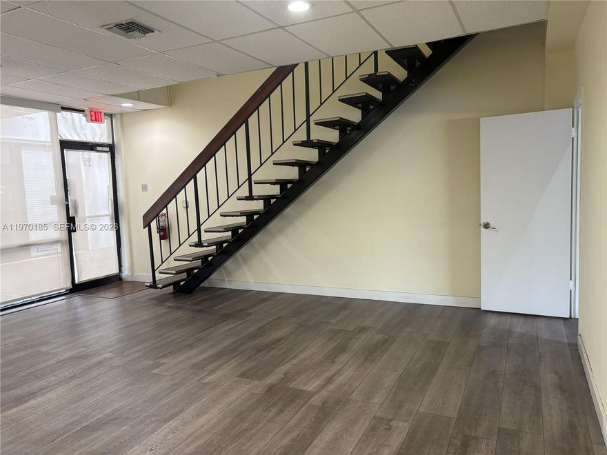 Excellent opportunity to own a well-maintained warehouse/flex industrial unit in Miami’s highly desirable Airport West submarket. This property features a functional warehouse area with high ceilings, concrete flooring, and a grade-level roll-up door for efficient loading and operations. The space includes a professionally finished office build-out with a mezzanine level, private offices, open work areas, modern flooring, recessed lighting, and a private restroom. Located within a well-managed industrial complex offering ample parking, clean common areas, and convenient truck access. Ideal for owner-users seeking long-term operational control or investors looking for a strong industrial asset in a central Miami location. Minutes from Miami International Airport and major highways including SR-836 and the Palmetto Expressway.