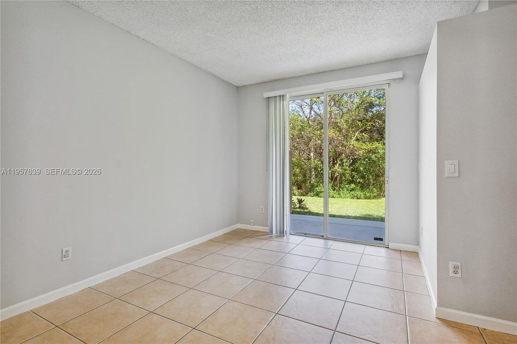 Photo of 5758 NW 48th Ave, Coconut Creek, FL 33073 (MLS # A11957639)