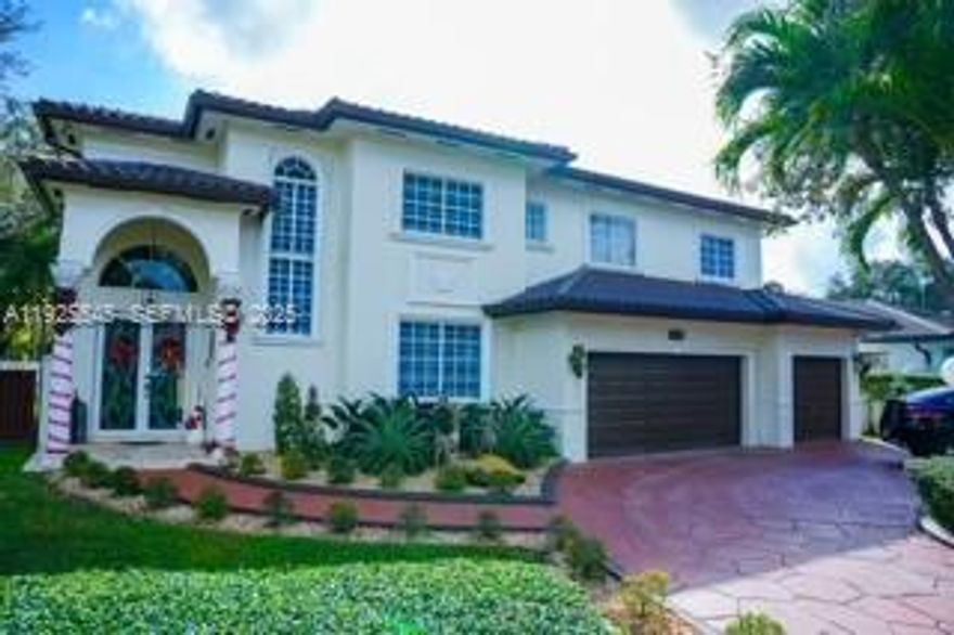 Discover this stunning two-story residence located in the exclusive gated community of Royal Oaks in Miami Lakes. This beautifully maintained home offers elegance, space, and exceptional curb appeal. Featuring 5 bedrooms and 4 bathrooms, the property provides bright, well-designed interiors perfect for families seeking comfort and style.

The grand entrance showcases an impressive façade with columns, high ceilings, and elegant exterior lighting that highlights the home’s architecture day and night. Inside, you’ll find spacious living areas, an open kitchen, and inviting spaces ideal for entertaining or relaxing with family.

Situated on an 8,453 sq ft lot, the property offers privacy, manicured landscaping, generous outdoor areas, and a covered driveway with ample parking. Located in one of the most desirable and secure areas of Miami Lakes, this home is close to top-rated schools, parks, shopping, dining, and major highways.

A rare opportunity to own an elegant, move-in-ready home in the prestigious Royal Oaks community—perfect for buyers seeking quality, space, and an exclusive lifestyle