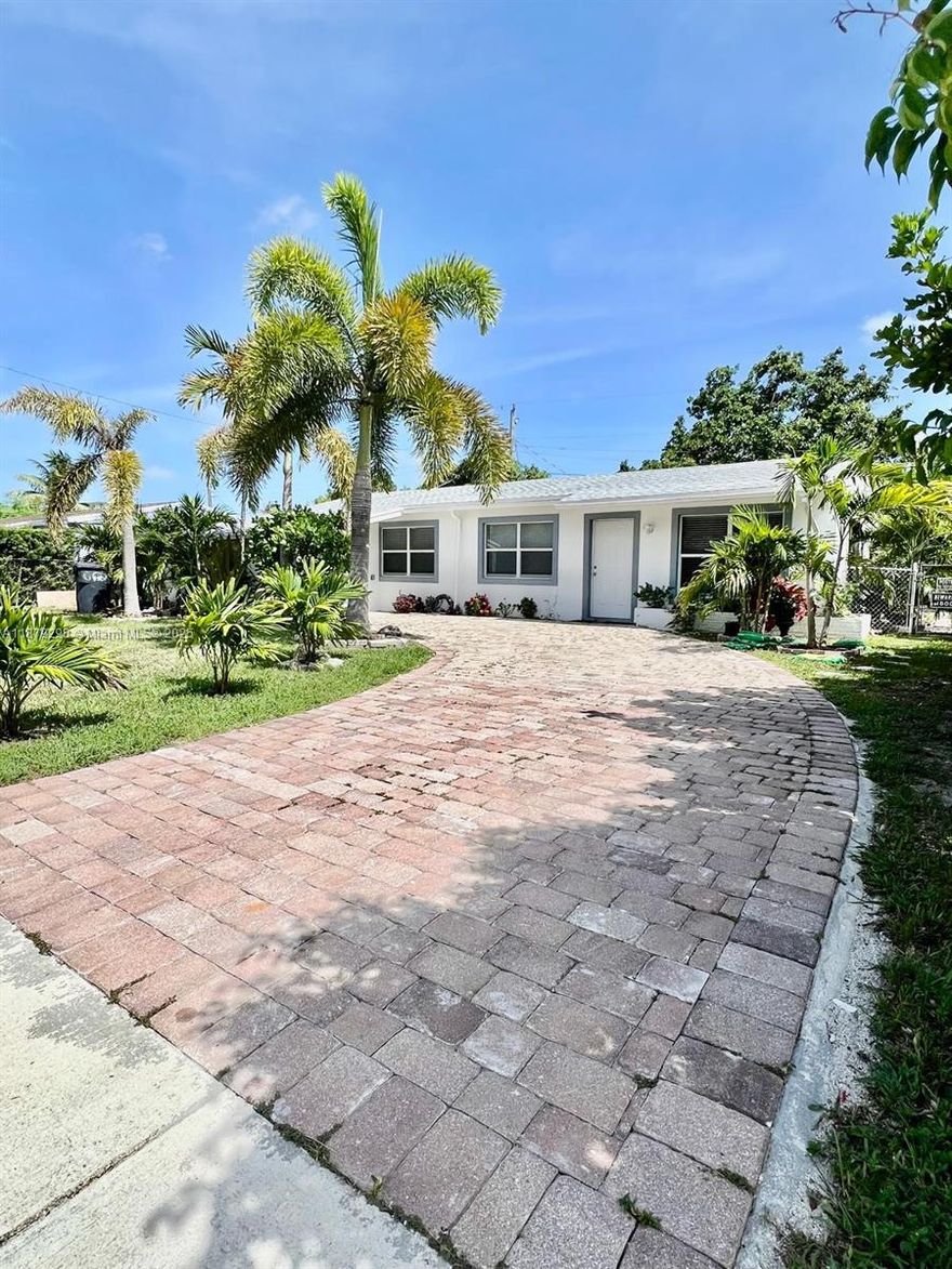 Significant Price improvement !This property has just become an even greater value. Stunningly renovated home with modern upgrades throughout. 4 Beds and 3 Full Bath. An abundance of natural light. Stainless-Still appliances, Counter kitchen in granite. Roof about 2 years old, and A/C. All impacts windows, ceramic tile floors, with an open floor plan and contemporary. No detail went unnoticed in this meticulously designed with modern finishes throughout. Gourmet Eat-In kitchen; En suite Master bedroom features large walk in closet and private walkout patio. spacious backyard for a pool. If you are looking, you owe it to yourself to not miss this opportunity.