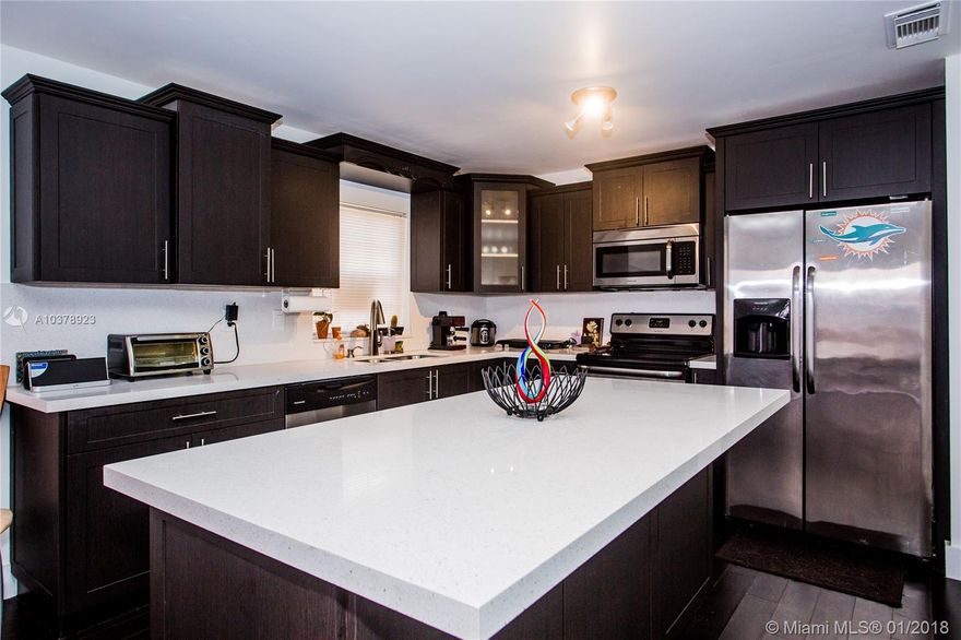 Beautiful completely remodeled 2 story home in the sought after community of Silver Palms on Coral Way. This home has a very modern, open concept layout your clients will love. Features grand high ceilings, huge living room area, separate florida and dinning room areas, big and beautiful new kitchen with an island, quartz countertops and all new SS appliances. 3 entrances to the back patio area, huge master bedroom including two walk in closets, shower, tub and bidet, half a bath on the first floor, more than enough closet/storage space, a large 2 car garage and much more you must see. This is the perfect home to entertain family and friends. LOW HOA. Call/Text LA for an appointment today.