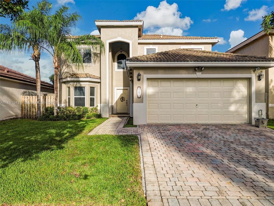 Experience the inspiring beauty of this Cutler Bay home, which features three bedrooms, 2.5 bathrooms, and a two-car garage, all framed by a breathtaking lake view in the coveted Pelican Bay Estate. The harmonious blend of bamboo floors on the second floor and tile on the first creates a warm, inviting atmosphere. With over 2,100 square feet of living space, the expansive floor plan fosters comfort and relaxation. Embrace tranquility as you unwind by the serene lake, rejuvenating your spirit after a long day. Nestled in a peaceful, family-friendly neighborhood, this home is ideally situated near great schools and Black Point Marina, with parks and convenient walkability to shops and grocery stores.