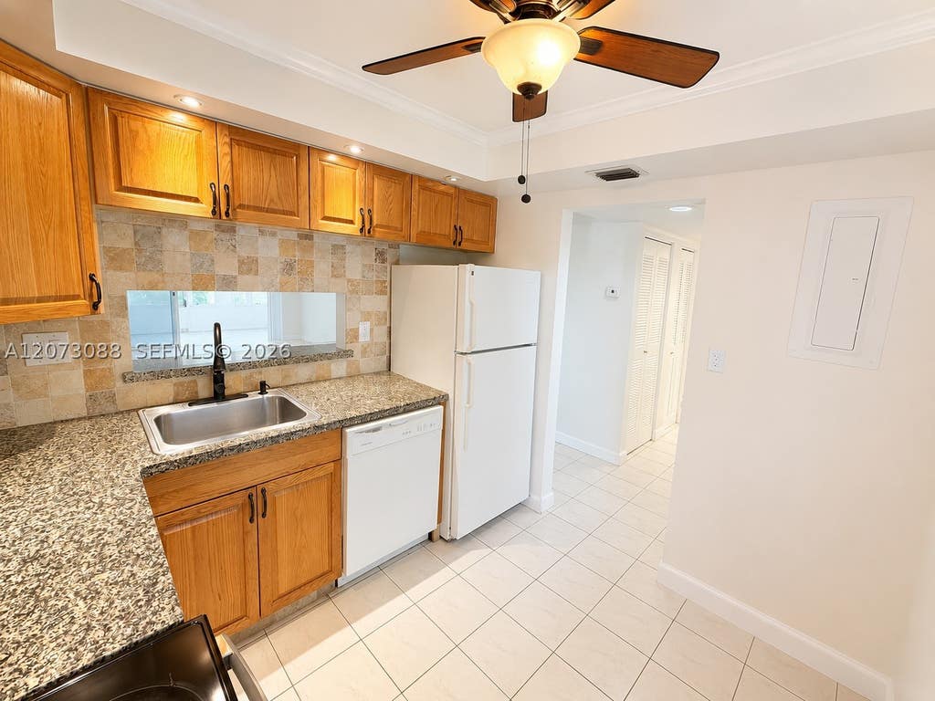 Photo of 3141 NW 47th Ter #324, Lauderdale Lakes, FL 33319 (MLS # A12073088)