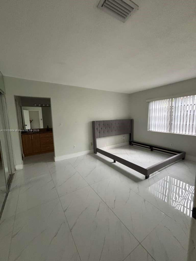 PALM SPRINGS NORTH SEC J - Residential Lease