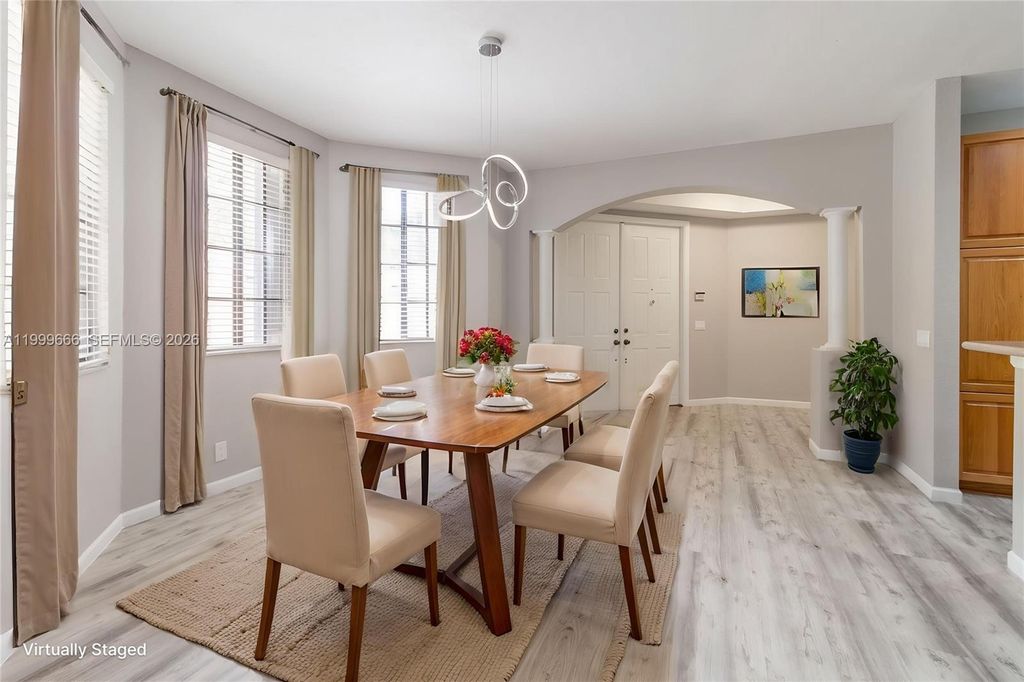 Photo of 1611 Passion Vine Cir #12-2, Weston, FL 33326 (MLS # A11999666)