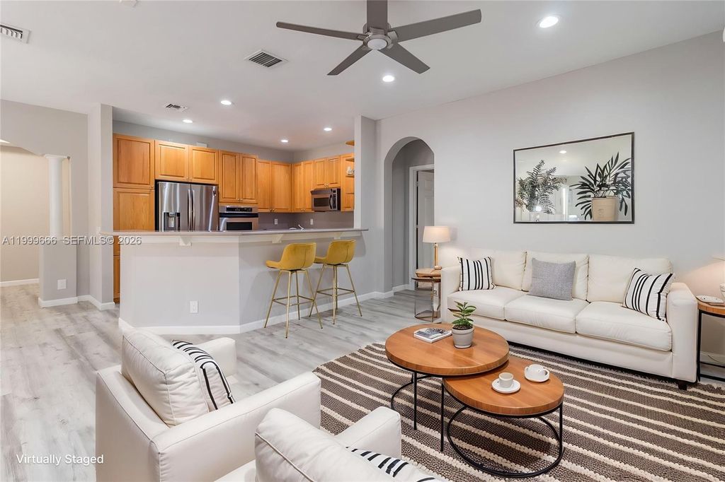 Photo of 1611 Passion Vine Cir #12-2, Weston, FL 33326 (MLS # A11999666)