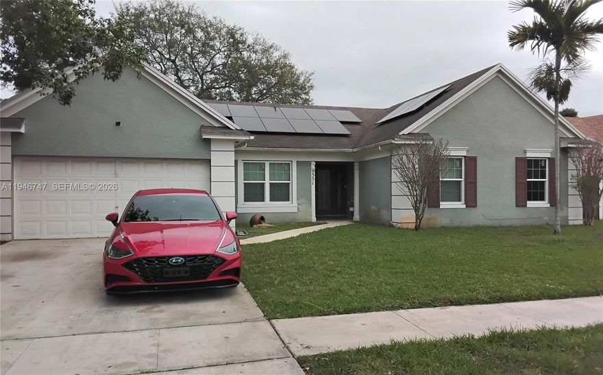 This stunning home features a brand-new central HVAC system (2025) with updated ducts and insulation, a solar system (2020), full impact windows & doors (2016), shingle roof was installed 2015, a new water heater, and a working outdoor jacuzzi with shed, new ladder, two ceiling fans, and a fresh outdoor swing. The spacious open-concept kitchen boasts granite countertops and backsplash, stainless steel appliances, ample room for bar stools, a breakfast nook, and space for a bar or desk. It flows seamlessly into the large den, which opens to a generous screened patio/Florida room. The roomy living area also connects to the patio, and there’s a versatile extra room perfect for use as a formal dining area, home office, guest room, game room, or more.  The laundry is located in the massive 2-car garage, along with the hvac, water heater, and sprinkler control.  This property is nestled in a well-kept neighborhood surrounded by other beautiful homes.  Do not miss this opportunity! Schedule an appointment before it is gone.