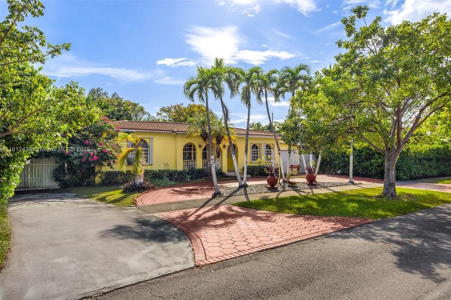 Located in sought-after Schenley Park, this 3-bedroom, 2-bath home with a flexible nook ideal for an office or reading area offers multiple living spaces filled with natural light. Formal living and dining rooms lead into a large family room with vaulted wood-beam ceilings and a fireplace, while a sunroom off the kitchen opens through French doors to a screened terrace and pool. The kitchen features granite countertops, an island, a breakfast nook, and stainless-steel appliances. A detached structure with plumbing and outdoor shower offers versatility for a guest suite or poolside retreat, complemented by a 1-car garage, storage shed, and private fenced setting.