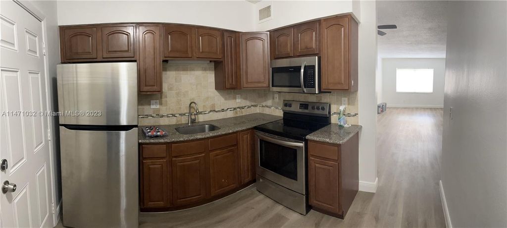 Photo of 1916 SW 11th St #10, Fort Lauderdale, FL 33312 (MLS # A11471032)