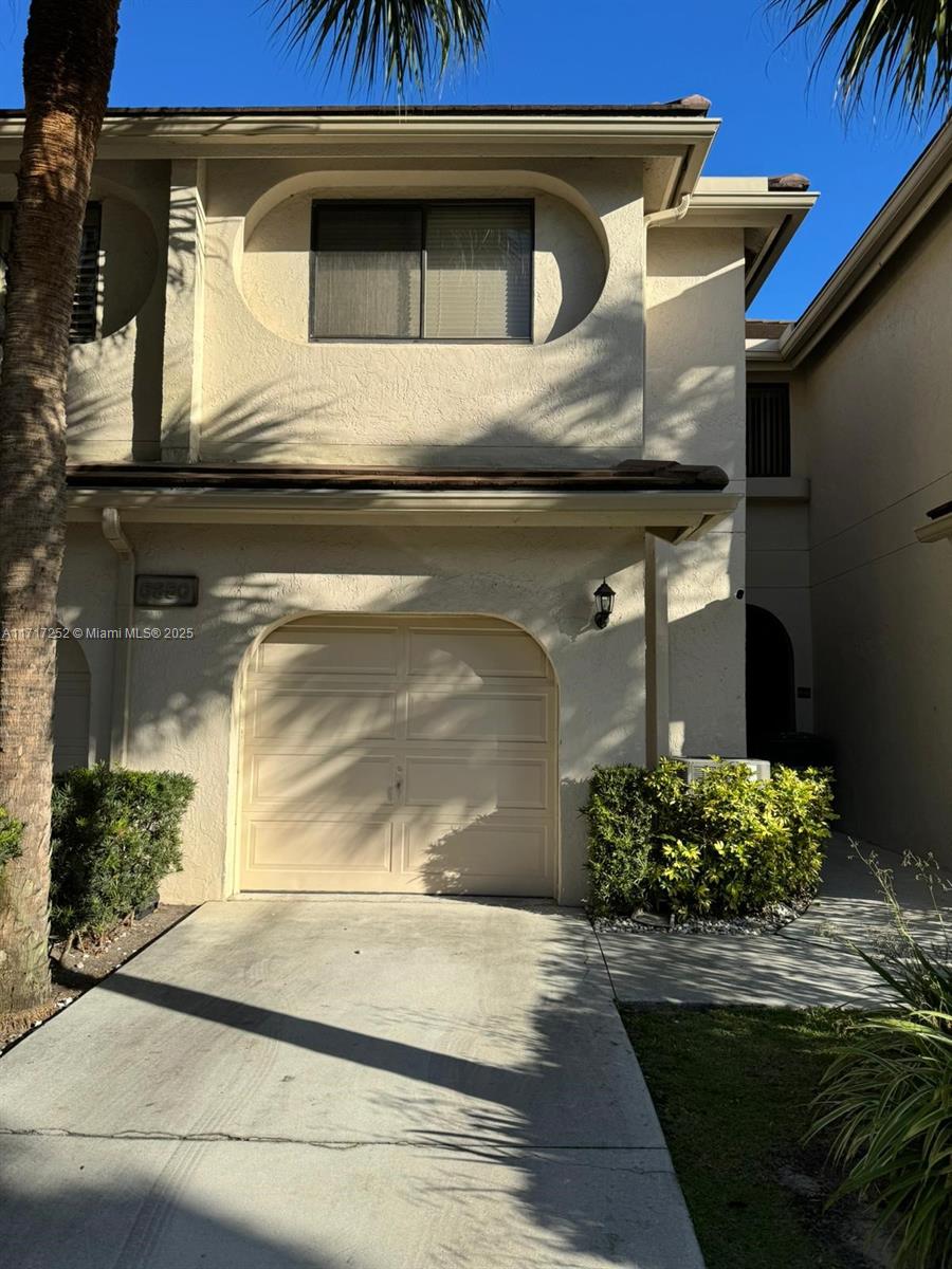 Spacious Town-home in a highly desirable Boca neighborhood. Nicely appointed features with updated electrical panel, large enclosed back patio and a spacious kitchen with stainless steel appliances. The TWO smaller bedrooms were converted into ONE large bedroom with ample closet space and can be reverted by adding a wall. Large master bedroom with walk-in closet and bathroom with working Jacuzzi for your relaxation. Seller will contribute 6 months of HOA with full priced offer.