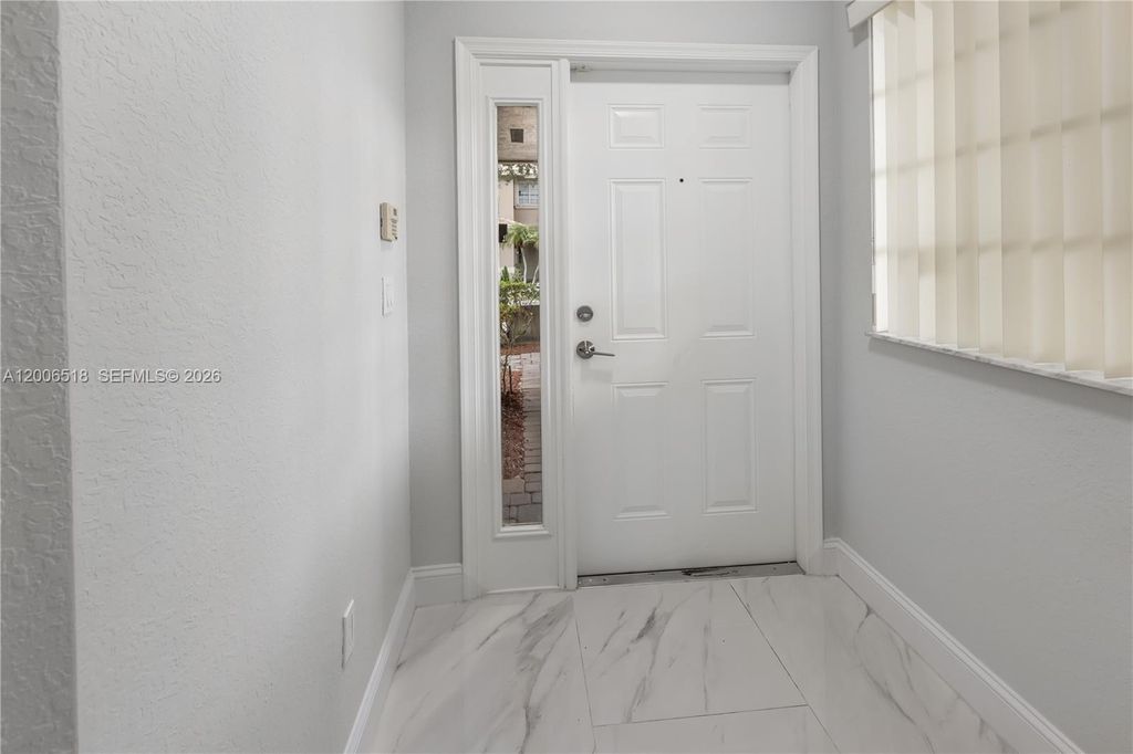 Photo of 2707 NW 80th Ave, Sunrise, FL 33322 (MLS # A12006518)