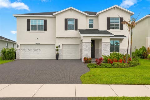 Photo of 12303 SW Roma Cir, Port St Lucie, FL 34987 (MLS # A12048846)
