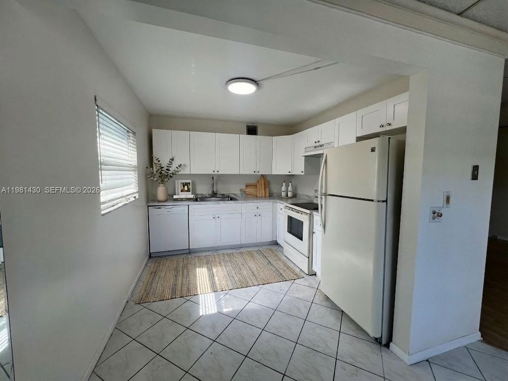 Photo of 850 SW 133rd Ter #201B, Pembroke Pines, FL 33027 (MLS # A11981430)