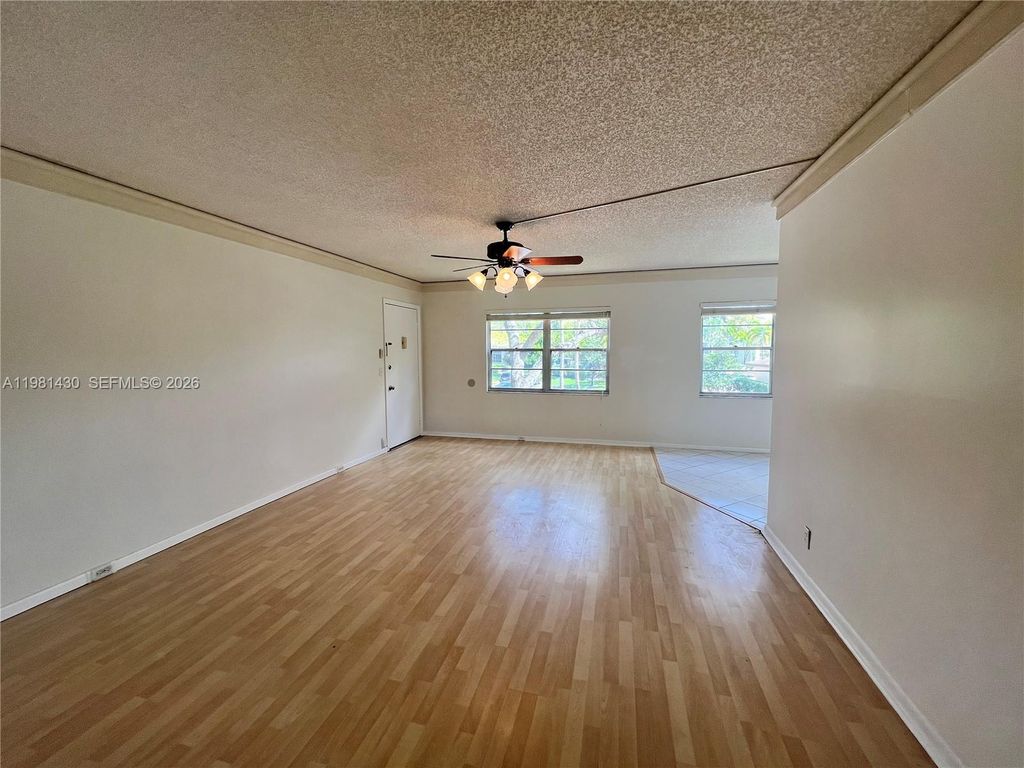 Photo of 850 SW 133rd Ter #201B, Pembroke Pines, FL 33027 (MLS # A11981430)