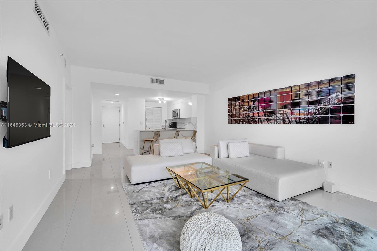 Don't Miss This Beautiful, Fully Updated, 1/1 Condo Rental In Vizcayne Condos In The Heart Of Downtown Miami, Across The Street From Bayside! The Stunning Kitchen Features Updated Cabinets, Stainless Steel Appliances, Quartz Waterfall Countertop, And Breakfast Bar. Just Off The Kitchen Is A Laundry Closet With Washer/Dryer. The Bedroom Has Balcony Access, Walk-In Closet, And Ample Space. In The Bathroom You Will Find A Spacious Shower With Frameless Glass, Large Roman Tub, And Vanity With A Mirror To The Ceiling. Vizcayne Condos Offer Incredible And Abundant Amenities Including Fitness Center, Three Swimming Pools, Sauna, Hot Tub, Events Room, Conference Room, Lobby Entrance And More! Unit Comes Partially Furnished With Couch, Bed, And TV And Water/Sewer Is Included In Rent.