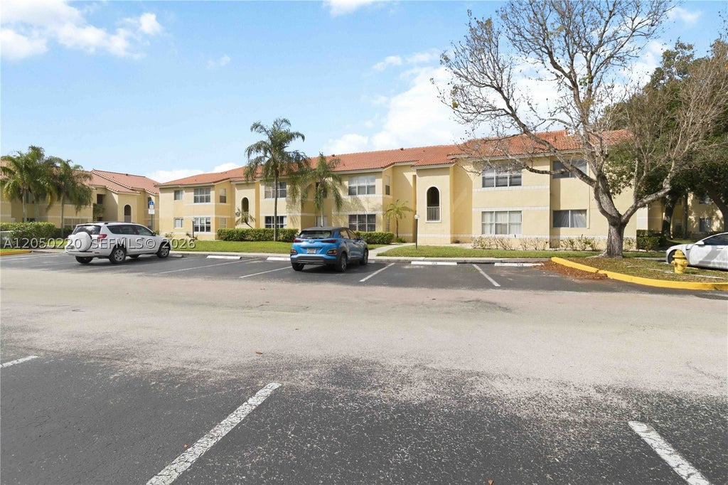 Photo of 12760 Vista Isles Dr #724, Sunrise, FL 33325 (MLS # A12050220)