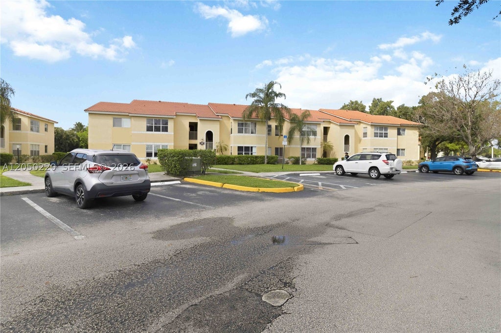Photo of 12760 Vista Isles Dr #724, Sunrise, FL 33325 (MLS # A12050220)
