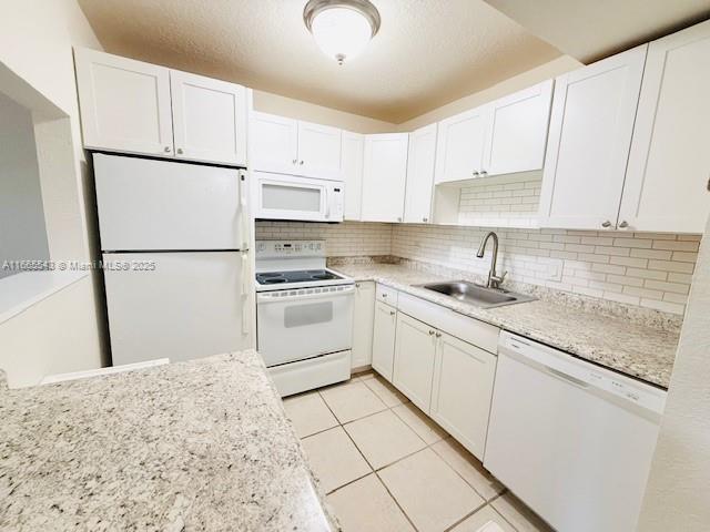 FULLY FURNISHED!Welcome to your serene escape in sunny South Florida! This spacious 1-bedroom condo offers a perfect blend of comfort and style, nestled in a quiet, well-kept community surrounded by lush landscaping. Step inside to discover a beautifully furnished living space that’s ready for you to move in. The open floor plan is bathed in natural light. The fully equipped kitchen features modern appliances and ample counter space. Large bedroom complete with a comfortable bed and plenty of storage. The bathroom is well-appointed, offering both convenience and privacy with a large walk-in closet. Located just minutes from pristine beaches, shopping, and dining, this condo provides the ideal South Florida lifestyle. Don’t miss your chance to own this fully furnished gem. 55+ Community.
