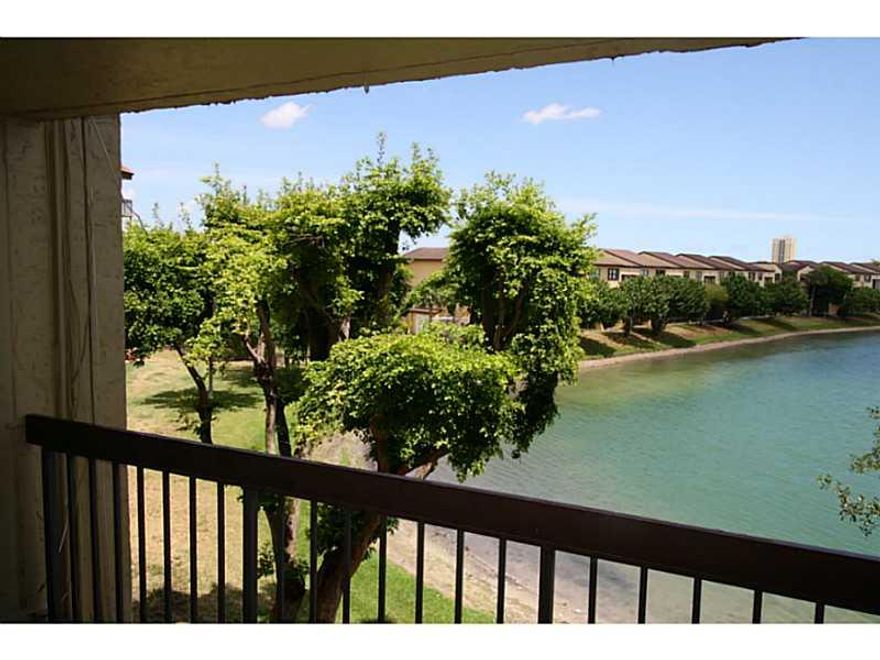 Great View!!! renovated unit painted in neutral colors, tile throughout, blinds, wood cabinets w/ granite counter topss.  Community has pool, tennis and basketball courts.  Close to bus stops, malls and airport.